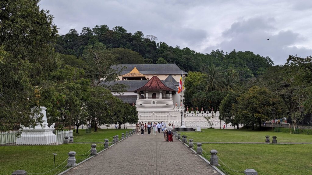 Front view of Temple of the Tooth Relic in Kandy with the garden in the front.