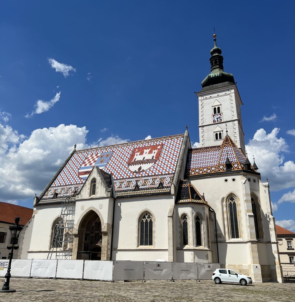 Side view of St. Mark's Church showing the tiled roof.