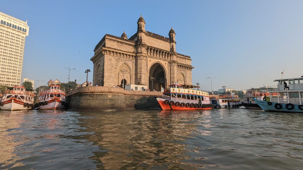 View of the back of the Gateway of India from a boat on the Arabian Sea, a top thing to do in Mumbai