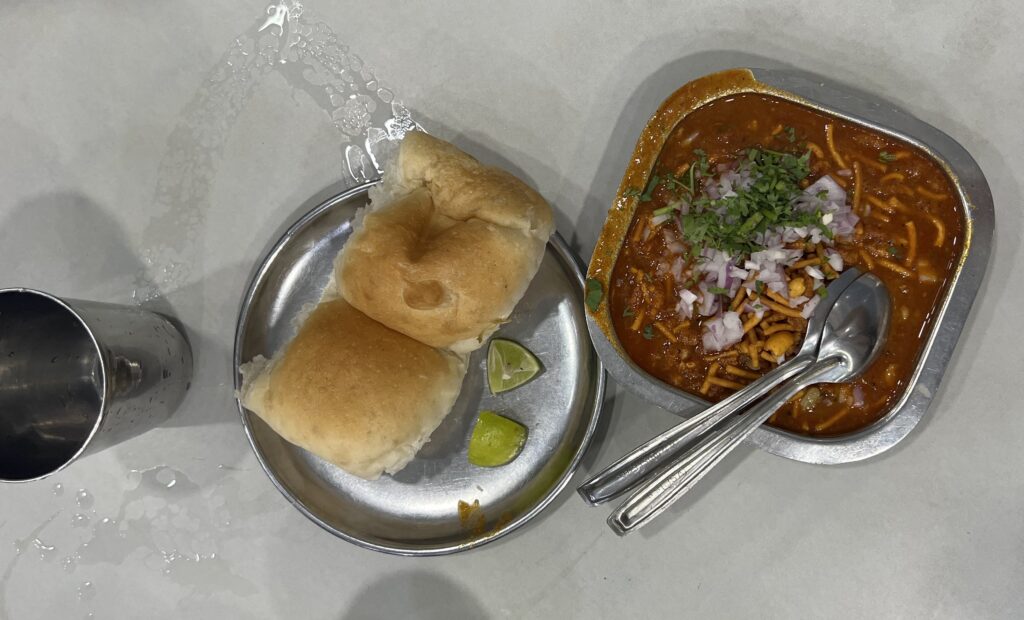 Overhead view of Misal Pav, a local street food in Mumbai