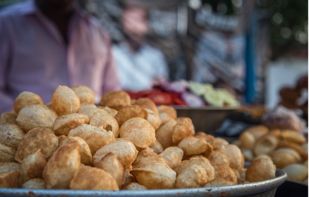 Close up of the puri in pile at pani puri stand, a must try street food in Mumbai