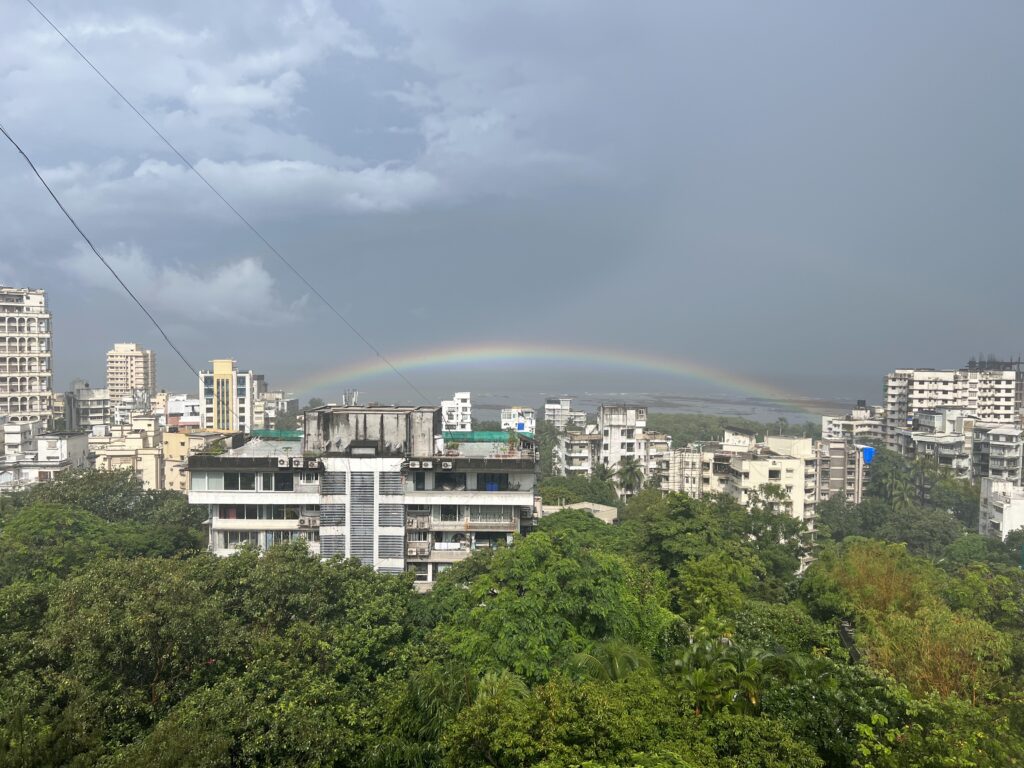 View from a balcony in Pali Hill in Mumbai with a rainbow over the Arabian Sea after the rains.