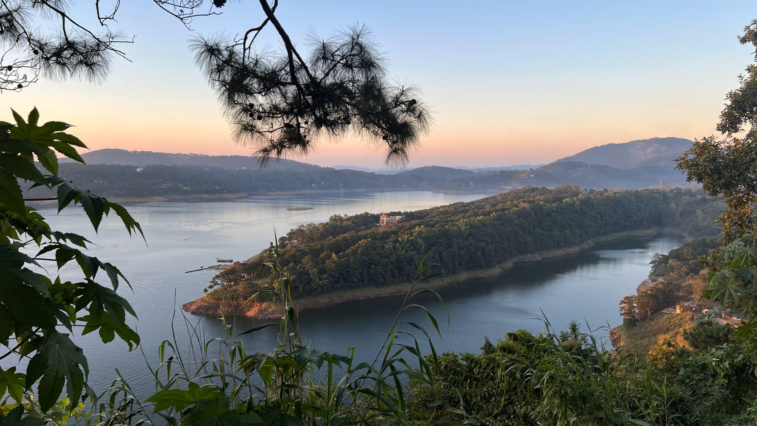 Panaromic view of Umiam Lake from Shillong-Guwahati highway with a sunset in the background.